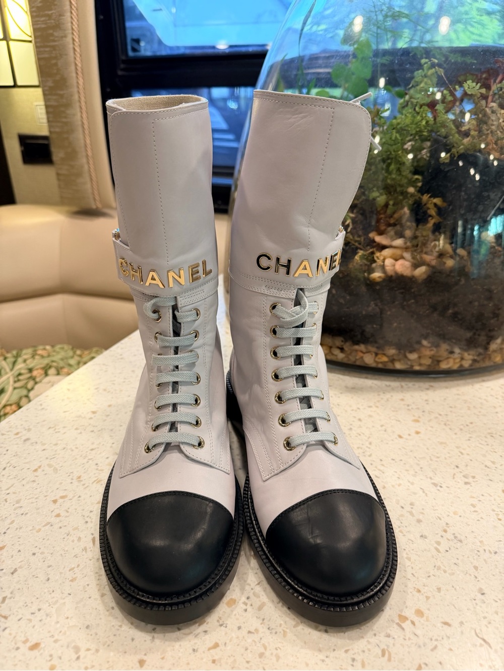 CHANEL White Leather Lace-Up Boots with Black Cap-Toe and Gold Logo